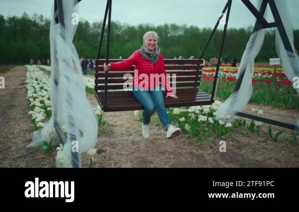 Mature woman swinging in park Stock Videos & Footage - HD and 4K Video ...