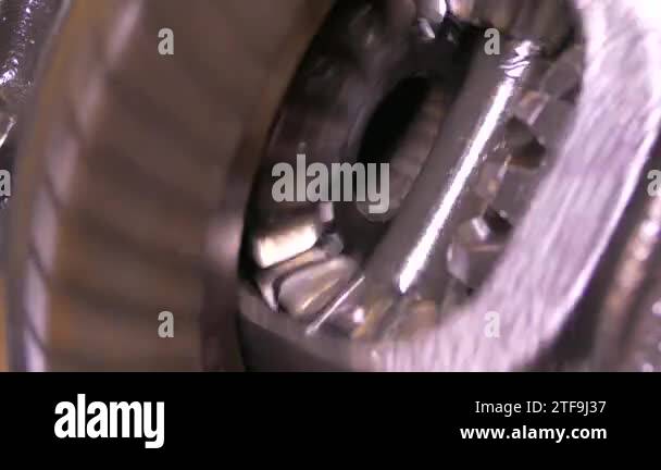 Spare Rotation A mechanism with rotating gears. Reducer from the middle. Metal ...