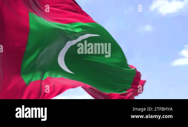 Detail of the national flag of Maldives waving in the wind on a clear ...