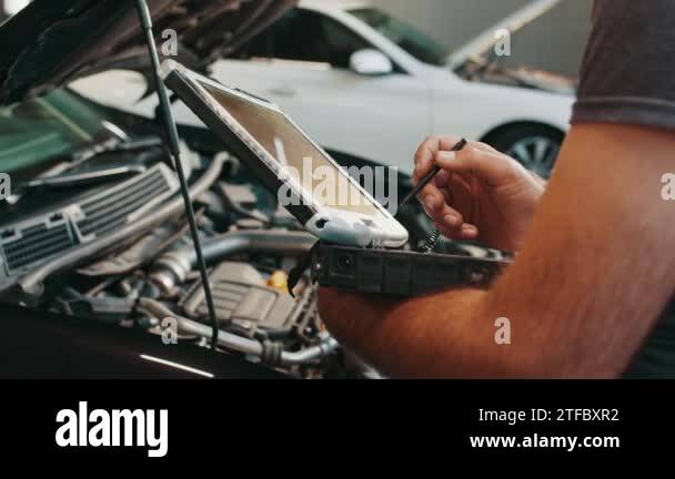 Hands Of Mechanic Working In Auto Repair Shop Car Electrician Repairs