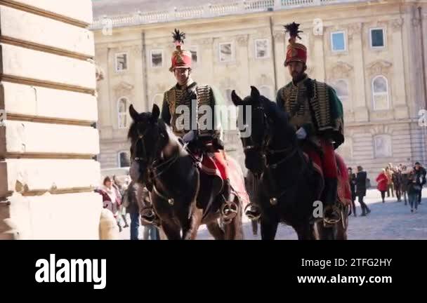 4 two Hungarian medieval soldiers in traditional uniform on horseback ...