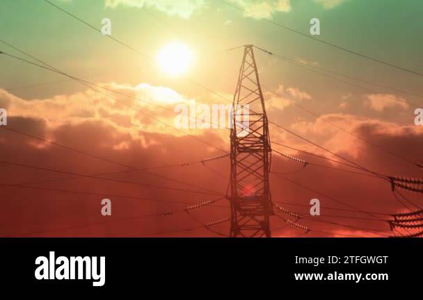 Time lapse of electricity pylons and high voltage power line at sunset ...