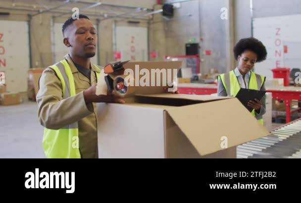 African american workers packing Stock Videos & Footage - HD and 4K ...