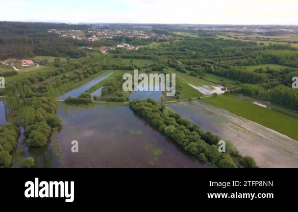 4K aerial view of the lagoon system of pateira de frossos in albergaria