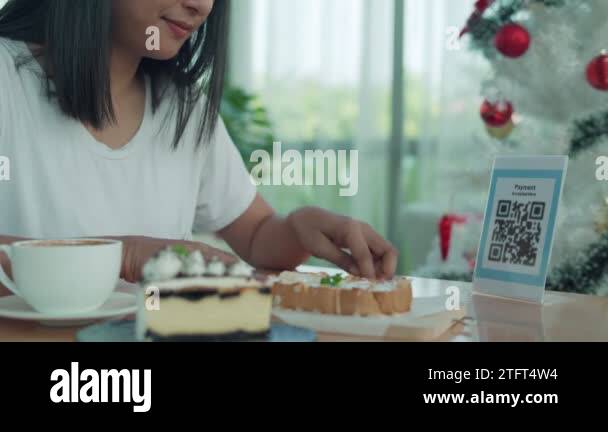 Beautiful woman scan barcodes for order. Women using their mobile ...