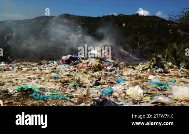 Landfill Pile Of Plastic Trash Garbage Waste Burning In Rubbish Dump ...