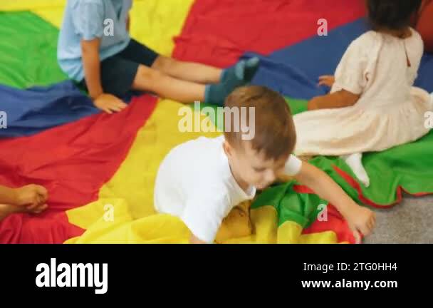 Children playing parachute Stock Videos & Footage - HD and 4K Video ...