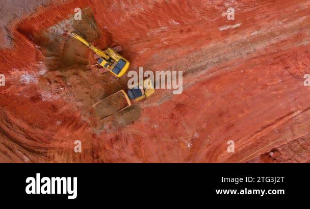 Excavator working backhoe digs ground of preparation process for new ...