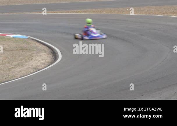 Karts cars in a curve running in a karting race Stock Video Footage - Alamy