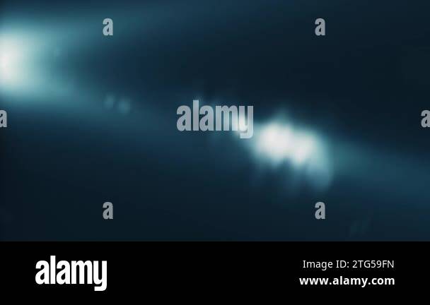 Abstract flicker blue optical lens flares light rotation animation on ...