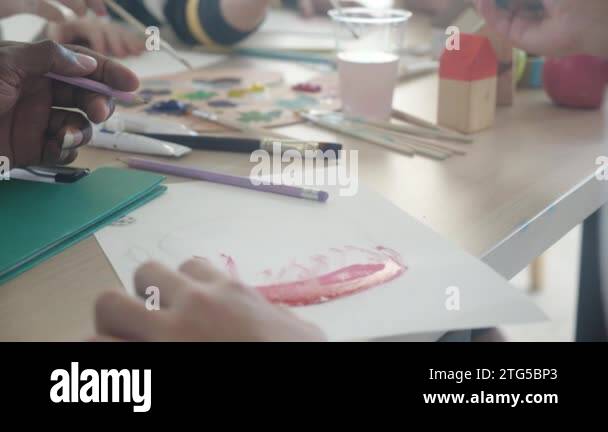 Closeup group of student sitting and studying and learning drawing with ...