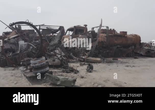 Destroyed Technical Destroyed military convoy. Burnt combat vehicles. Rusty tech ...