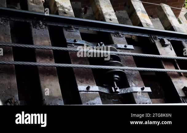 Stainless Steel Wire Ropes slide on iron wheels. The mechanism of ...