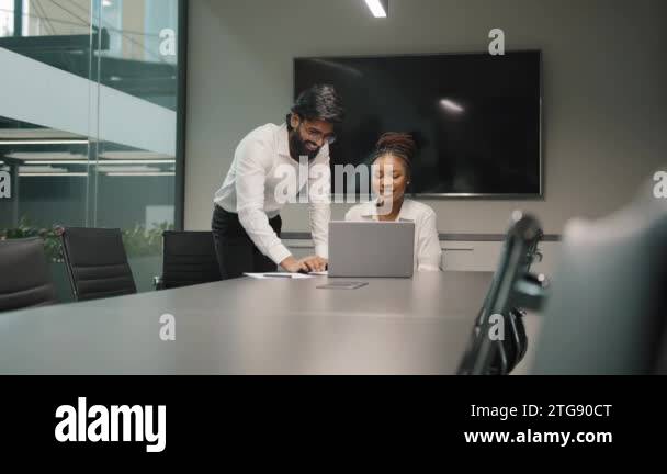 Professional Arabian Indian teacher mentor helping African woman new ...