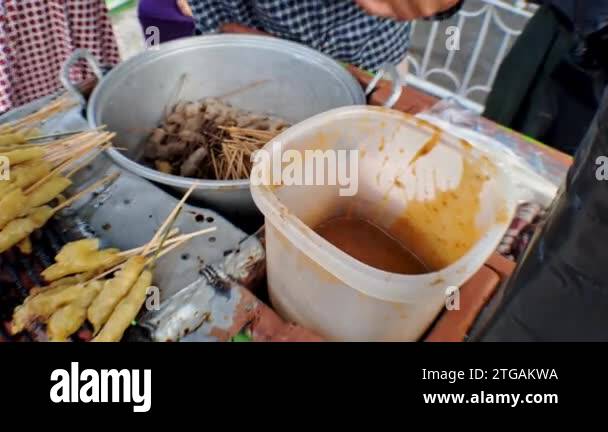 Street Food satay tofu (sate tahu), Tofu grilled with soy sauce, the