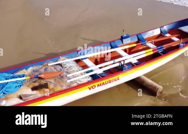 Fishing boat made fromGarapuvu tree, used in mullet fishing in ...