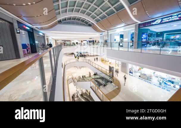 Shoppers in shopping mall, showing the modern interior design, with ...