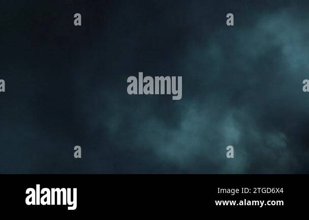 Atmospheric smoke in 4K slow-motion. Hazed background. Abstract ...
