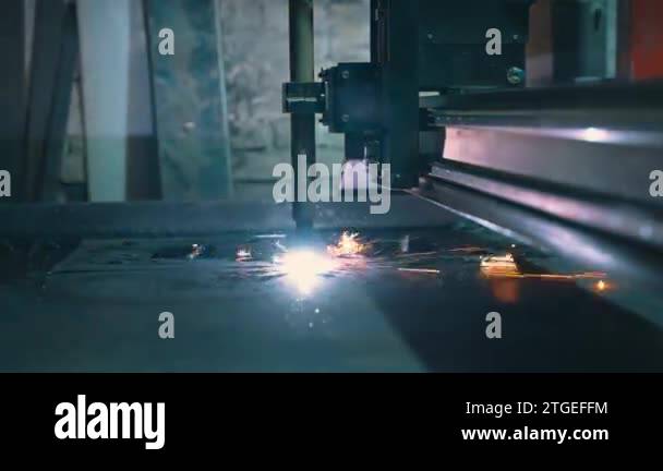 Laser cutter in production. Industrial cutting of metal with a plasma ...