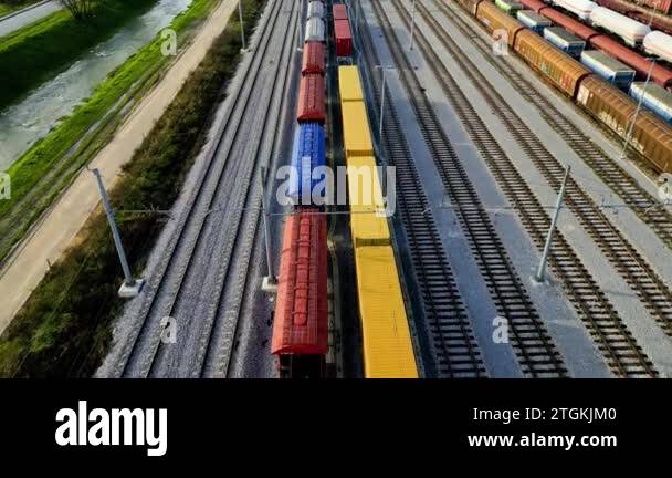 Train View Video Cargo trains close-up. Aerial view of colorful freight trains on the ...