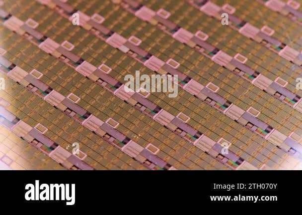 full-frame looped spinning silicone microchip wafer with gold colored ...