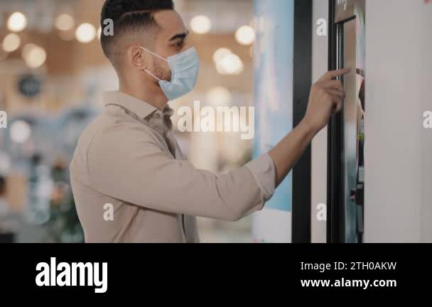 Arabian Indian passenger male buyer man in medical mask using self ...