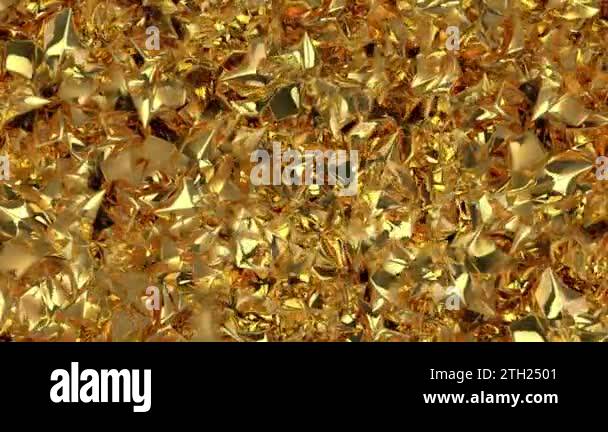 Brilliant liquid ripples on the golden surface of a technological ...