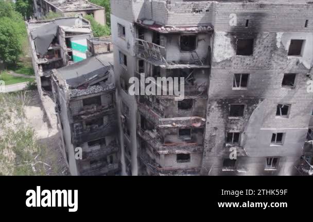 This stock video shows a destroyed residential building during the war ...