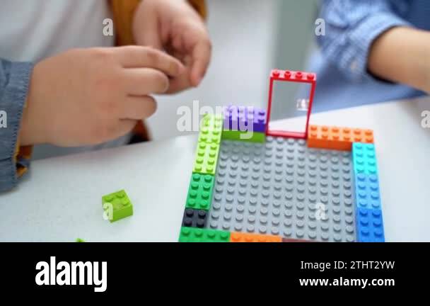 Robotics programming class. Children construct and code Robot. STEM ...