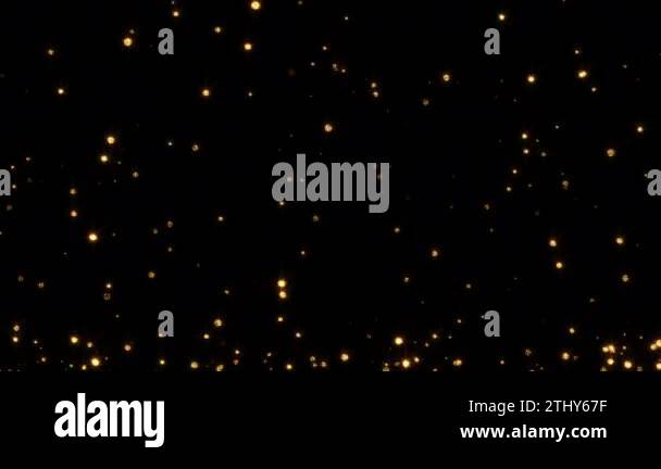 Loop flickering glittering gold star particles float up on black ...