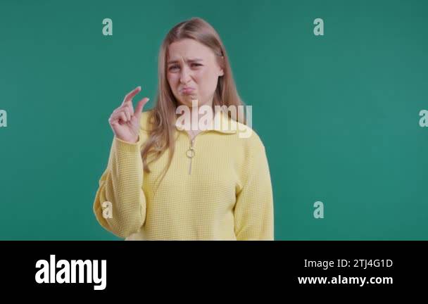 Young woman showing difference between invisible abstract subject or ...