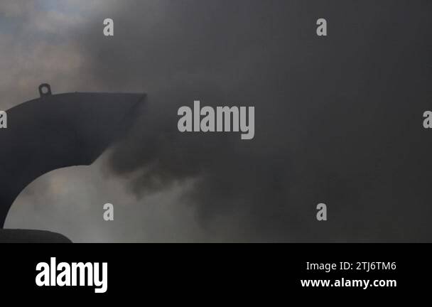 Black smoke from ferry boat flue in background, close up, Thailand ...