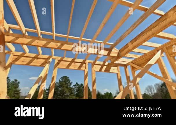 Building frame house made out of wooden beams stick framework for new ...