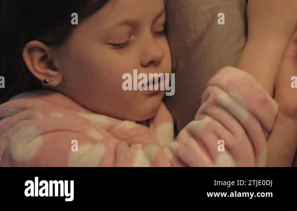 Night terror. Kid nightmare. Disturbed scared sleeping little girl ...