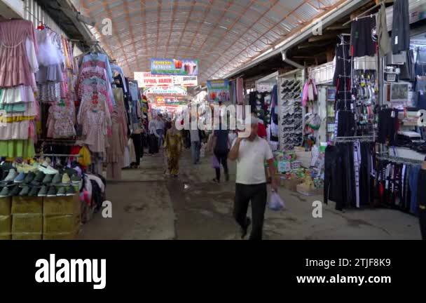 Osh, Kyrgyzstan - May 2022: People shopping at Osh Bazaar, the primary