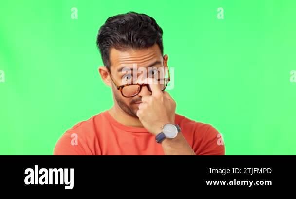 Green screen, suspicious and face of a man with glasses isolated on a ...