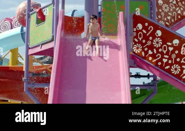 Drunk Slide Ride Boy Having Fun On Water Slides Aqua Park Glides. Funny Ride On Water ...
