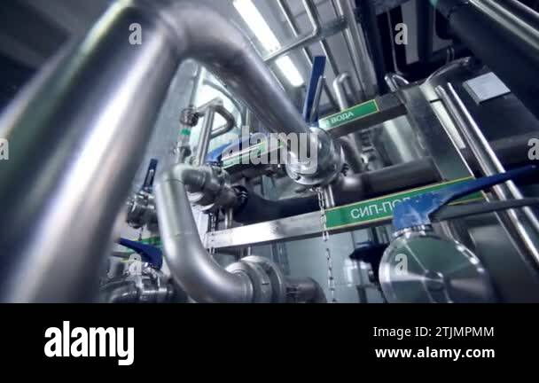 Pipe system, pipelines with valves at modern plant, factory indoor ...