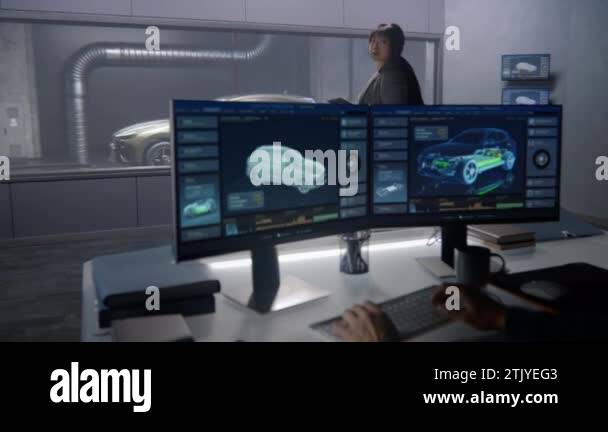 Car design engineers in a lab testing the aerodynamics and body of a