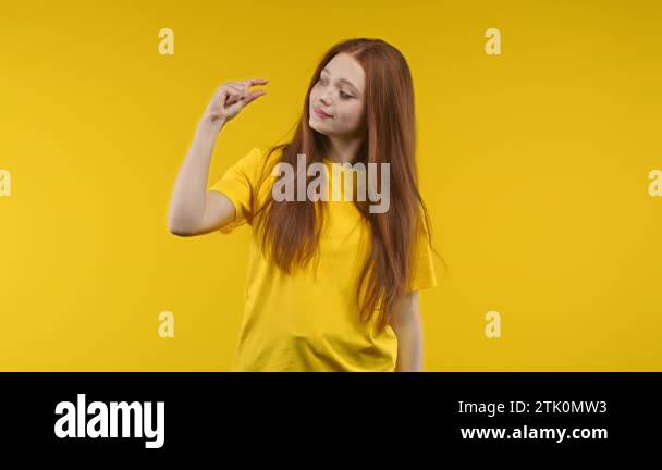 Big large and small tiny concept. Woman showing difference between ...