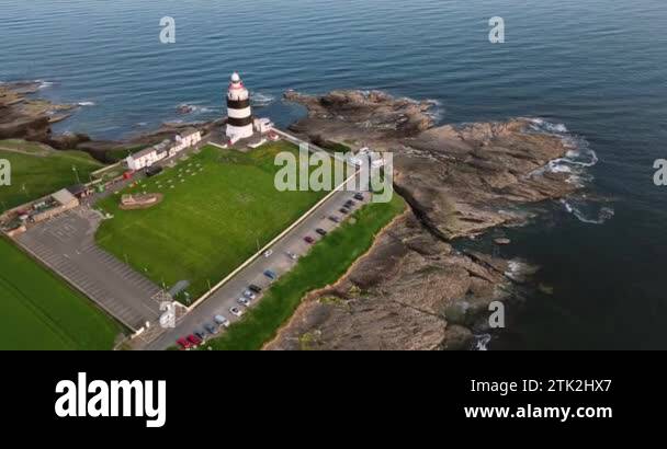 Aerial. 4k Hook Lighthouse situated on Hook Head at the tip of the Hook ...