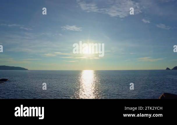 Amazing sunlight over sea sun ray and sunset or sunrise over the calm ...