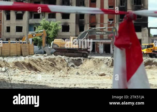 The destruction of a multi-storey building after being hit by an ...