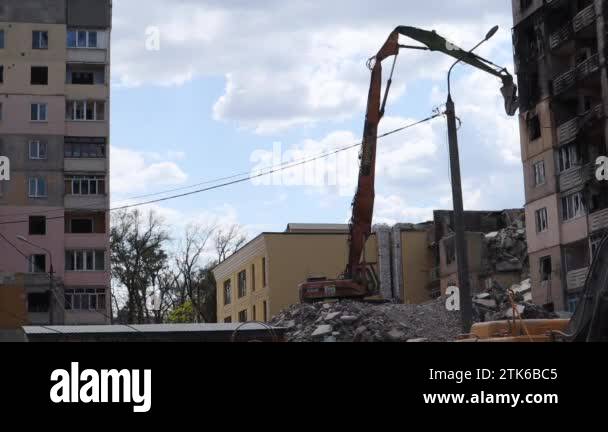 The destruction of a multi-storey building after being hit by an ...