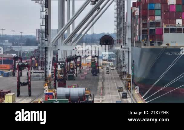 Container ship loading and unloading port of southampton Stock Videos ...