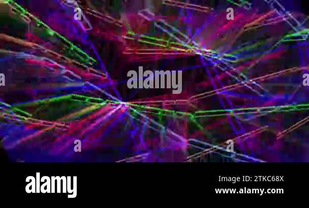 Multi-colored rays of light flicker and move in three-dimensional space ...