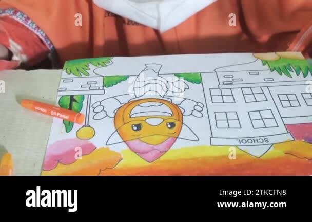 An Asian girl is coloring a character with an orange crayon. Coloring ...