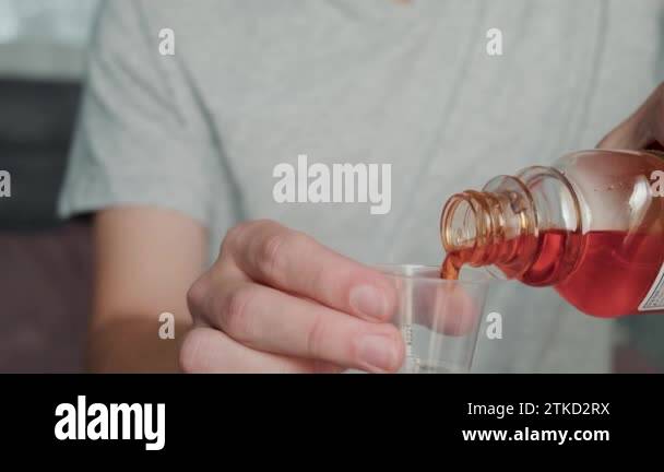 One Portion Man Man poring portion liquid medicine Stock Videos & Footage - HD and 4K ...
