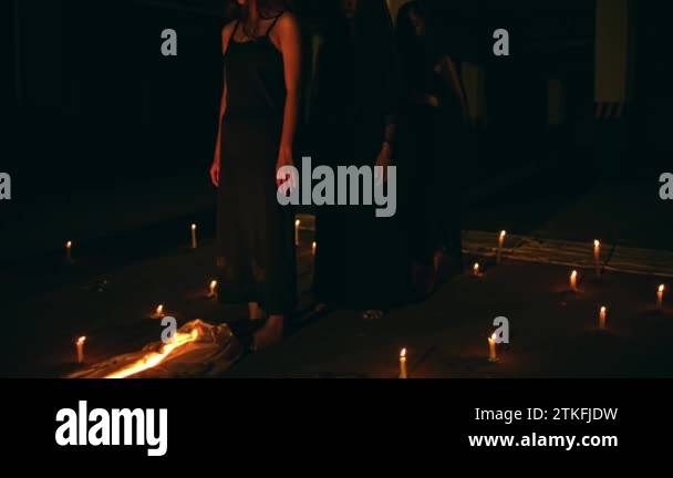Satanic Performance a group of satanic women perform a spirit summoning ritual in the ...