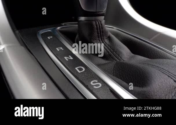 Switching gear lever from parking mode to sport mode. Shifting ...